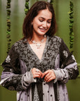 A women wearing black and grey Chanderi silk Anarkali kurta set.