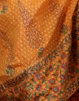 A women wearing Orange Anarkali Kurta Set with Purple Dupatta.