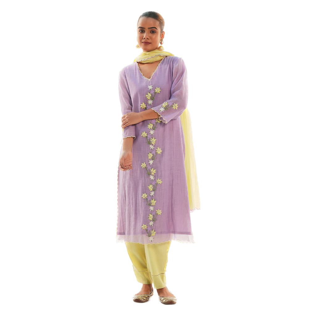 A women wearing purple colored kurta set with lemon colored pants and dupatta.