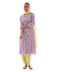 A women wearing purple colored kurta set with lemon colored pants and dupatta.