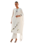 A women wearing White Kurta Set with White Dupatta.