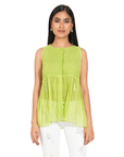 A women wearing parrot green colored designer sleeveless top with white pants.