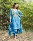 A women wearing Blue Kurta Set with Dupatta.