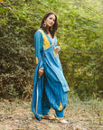 A women wearing Blue Kurta Set with Dupatta.