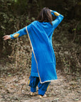 A women wearing Blue Kurta Set with Dupatta.