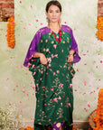 A women wearing Kaftan Kurta Set of green and purple colour.