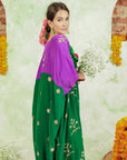 A women wearing Kaftan Kurta Set of green and purple colour.