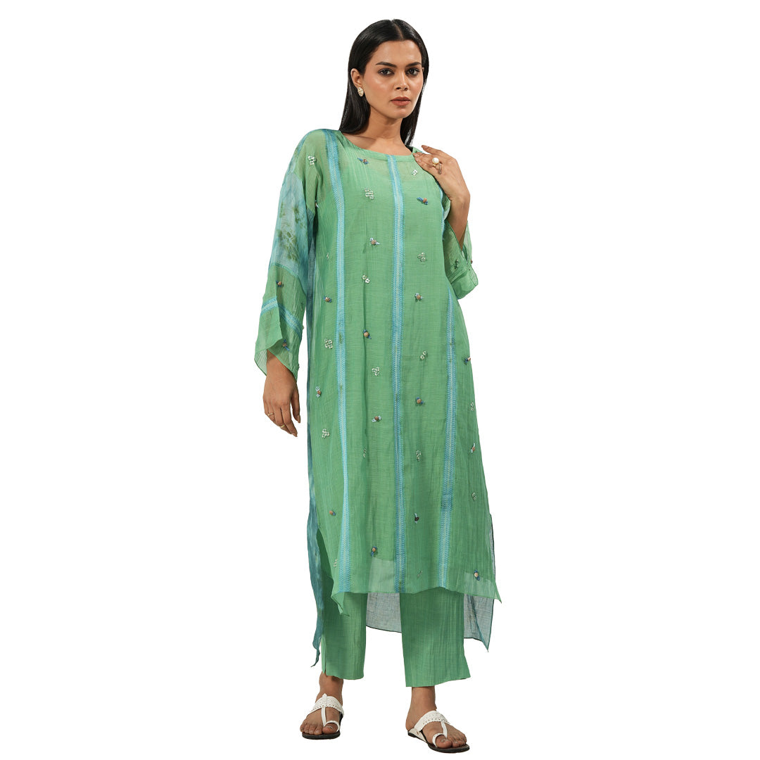 A women wearing Green Kurta Set with pants.