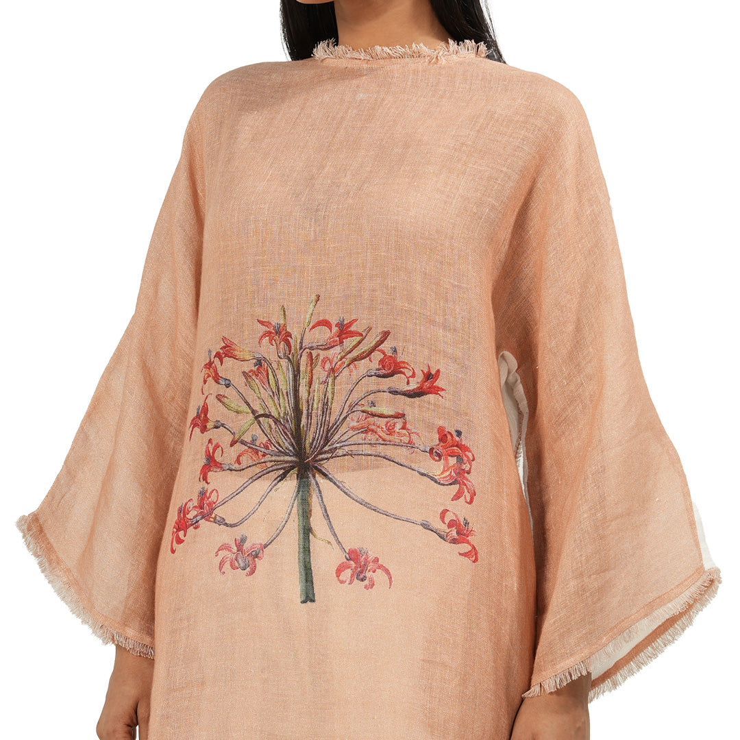 A women wearing stylish full sleeves pink kurta set.