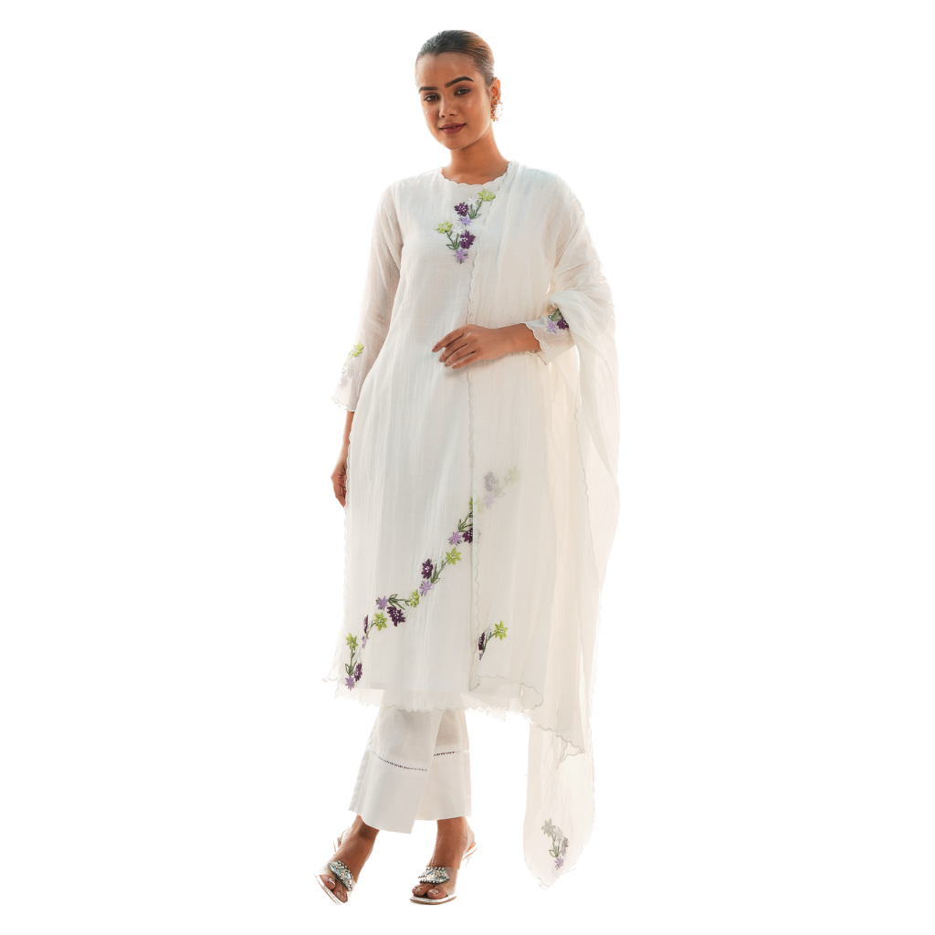 A women wearing White Kurta Set with White Dupatta.