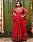 A women wearing Red Anarkali Suit Set with Dupatta.