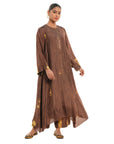 A woman wearing brown colored Kaftan Kurta Set.