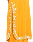 A women wearing stylish whole orange kurta set with palazzo and dupatta.