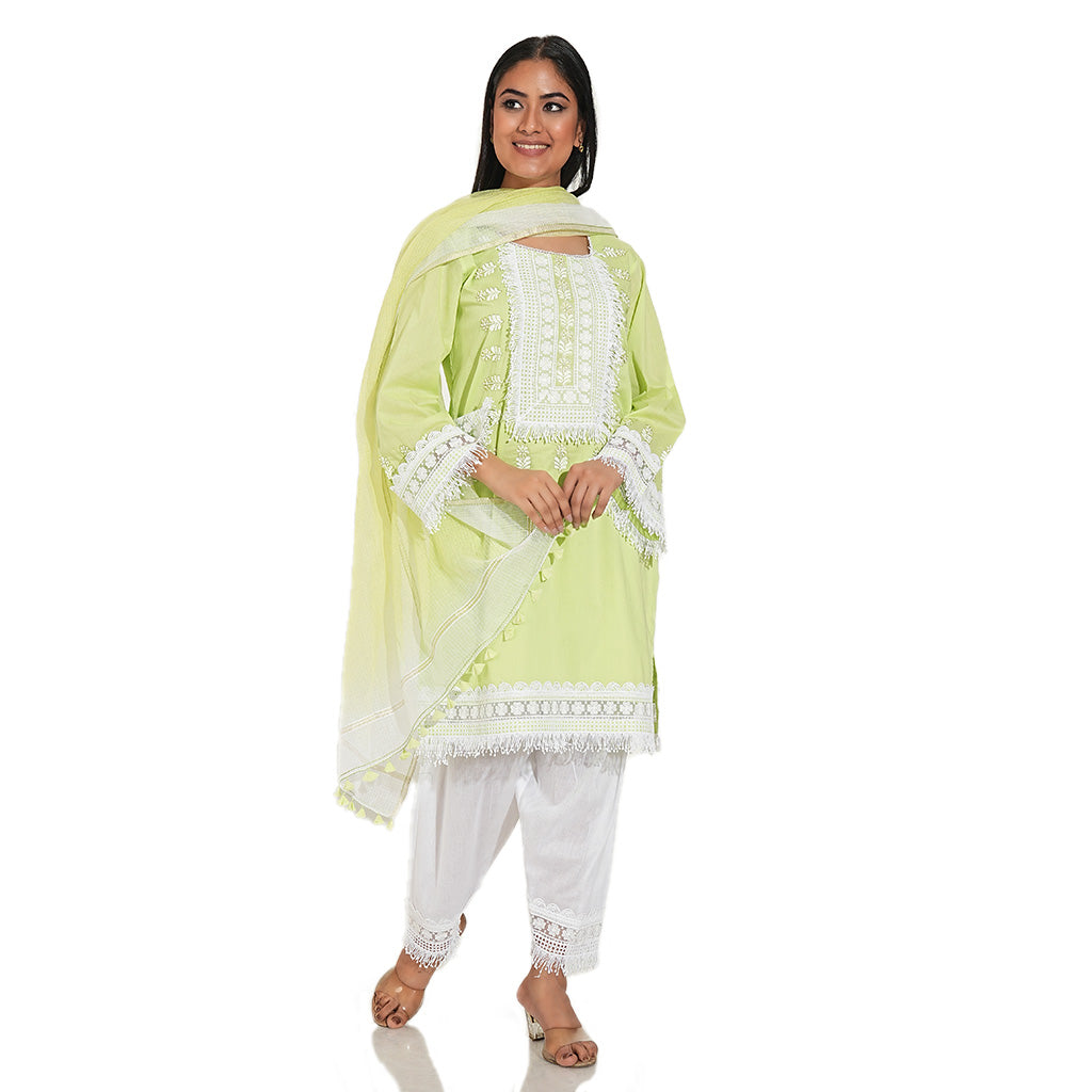 A women wearing light yellow kurta set with white embroidery on it with white pants and dupatta.