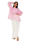 A woman wearing white and pink colored co-ord set.