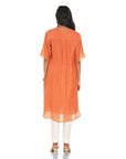 A women wearing Orange Kurta Set with White Pants.